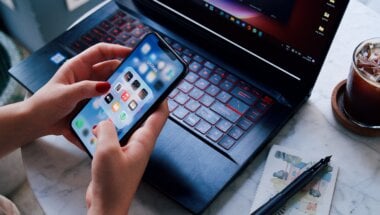 Person completing a SaaS onboarding process on their mobile device.
