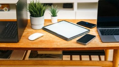a variety of surfaces on a desktop as an example of feature parity isn't always the goal of a successful SaaS strategy.