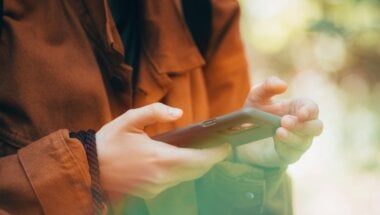 A person engaging with a SaaS trial on their mobile device.